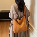Caramel matte leather tote bag with pleated shoulder strap and front patch pocket - Brown