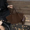 Minimalist large brown suede tote bag with irregular wing design and inner pouch - Brown