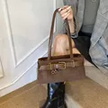 Vintage brown suede underarm tote bag with leather belt buckle and long shoulder straps - Brown