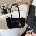 Black frosted suede tote bag with wooden bead charm and silver buckle detail - Black