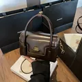 Retro deep brown glossy patent leather handbag with gold logo and crossbody strap - Basic Style / Black