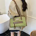 Retro green suede tote bag with brown leather trim and metal detail for women - Green