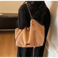 Large camel suede tote bag with fringe details and soft texture for commuting - Brown