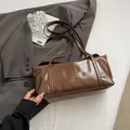 Dark brown shiny leather shoulder bag with CLEARSK logo embossed on the surface - No Pendant Basic Style / Coffee