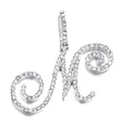 Macro shot of a silver letter M pendant with dense pave setting of white cubic zirconia - M (Silver)