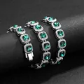 Macro detail of iced-out hip hop bracelet featuring square emerald stones and silver plating - 45cm / Necklace / Silver Green Stone