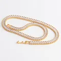 Close-up of gold-plated hip hop tennis chain with micro-paved rectangular zircon stones - Necklace