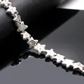 Silver star-shaped bracelets featuring lava rock texture and metallic finish charms - Silver