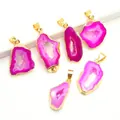 Natural agate geode slice pendants with gold plated edges on a clean white background - Red Random