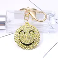 Portachiavi con faccina sorridente in strass gialli e chiusura a moschettone d'oro - Stile smiley giallo