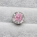 Gros plan sur une perle en argent avec strass roses pour bracelet à breloques DIY - Rose