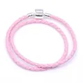 Détail du bracelet double tour en cuir tressé rose avec fermoir barillet en argent - 18cm / Rose