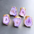 Detail view of five natural purple agate druzy rings with polished gold-plated edges - Purple