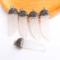 Detail of horn shaped natural crystal pendants with pave rhinestone caps and silver rings - White Crystal