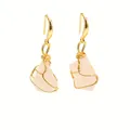 Detail of handmade wire wrapped pink crystal stone earrings with gold metal accents - Rose Quartz