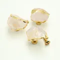Detail shot of natural rose quartz stone drawer knob with gold brass hardware and screw - White Crystal