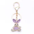 Golden alloy rabbit keychain with purple and white rhinestones and lobster clasp - Purple Rabbit (Gold Base)