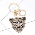 Portachiavi testa di leopardo dorata con strass scintillanti e chiusura a moschettone - Testa di Leopardo / Oro