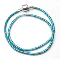 Blauw en gouden dubbele wikkelarmband met gepolijste zilveren cilindersluiting - Blauw / 17cm