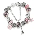 Bracciale argentato con ciondoli a forma di Torre Eiffel, corona e fiori rosa vivaci - 16cm / Stile Torre Eiffel Rosa