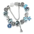 Bracciale argentato con perline blu, ciondolo a forma di Torre Eiffel e corona - 16cm / Stile Torre Eiffel Blu