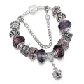 Bracciale europeo con ciondolo corona, perline viola e catena a serpente d'argento - 16cm / Viola