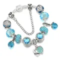 Bracciale di perle in cristallo blu con catena a serpente e ciondoli cuore e rosa - Blu lago / 16cm
