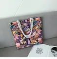 Detailed macro view of heavy rope handles on a tropical print canvas tote bag - Purple Leaf