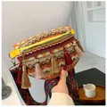 Bohemian lace waist bag in orange and beige featuring colorful tassels and ethnic strap - Yellow