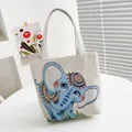 Borsa tote in tela con ricamo elefante blu e motivi etnici colorati - Standard / Elefante Blu