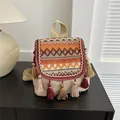 Ethnic embroidery canvas backpack in beige with boho tassels and geometric patterns - Orange