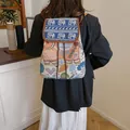 Zaino bohémien in jacquard con motivo a elefante, coulisse e ricami floreali - Elefante Colorato