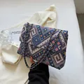 Vintage woven shoulder bag with pink and blue geometric patterns and gold chain - Blue