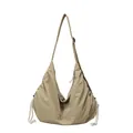 Large khaki nylon dumpling crossbody bag with adjustable wide strap and drawstring detail - Khaki