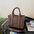 Retro leopard print tote bag with brown faux leather trim and woven handle details - Brown