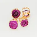 Detailed view of four adjustable gold-plated rings with purple agate slices and crystals - Sun Flower Natural Stone Style (TGB7525792341) / Red