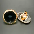 Detailed close-up of natural agate stone rings with gold plating and adjustable band - Black