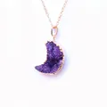 Detailed view of crescent moon purple druzy quartz pendant with gold plated edges - Purple