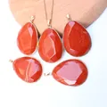 Faceted red jasper drop pendants with gold plated edges on a natural wooden display - Pendant Only (Without Chain) / Red Jasper