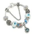 Silver snake chain bracelet with blue earth charm and floral tea set beads - 16cm / Silver