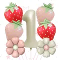 Detail of strawberry balloons, daisy flowers and beige number 1 balloon for first birthday - Number One Theme Style