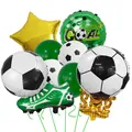 Close-up of soccer themed balloon set with gold trophy and green football shoe foil balloons - Type B Trophy Green Shoes