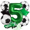 Detail view of soccer party balloon set featuring green number five and sports shoe balloons - Number 5