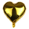 Close-up of heart-shaped gold foil balloon with metallic finish and inflation valve - Gold