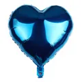 Close-up of heart-shaped blue foil balloon with metallic finish and inflation valve - Blue