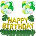 Tropical jungle birthday party set with gold happy birthday balloons and green palm leaves - Gold Monstera Leaf Birthday Theme