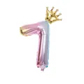 Close-up of number 7 foil balloon with gradient colors and a golden crown topper - Number 7 / Pink Gradient