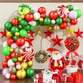 Christmas balloon arch kit with Santa foil balloons and candy cane decorations for parties - Lollipop Candy Cane Garland Set