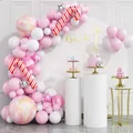Kit arco di palloncini natalizi rosa e bianchi con bastoncini di zucchero per feste - Catena di Palloncini Marmo Rosa