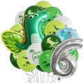 Macro view of dinosaur party kit with green latex balloons and silver number 6 foil balloon - Number 6 Style